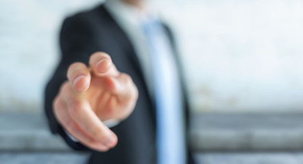 Businessman pointing his finger