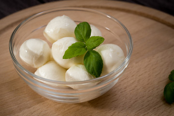 Mini mozzarella in a glass bowl