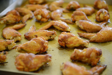 Ali di pollo cottura al forno a legna