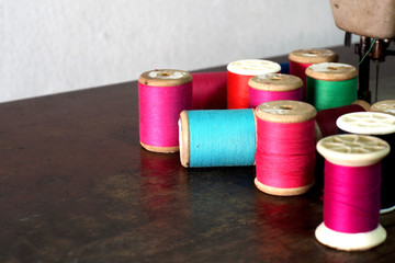 colorful bobbins of thread