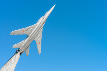 Soviet Air jet model on concrete basement with blue sky background, sunny weather