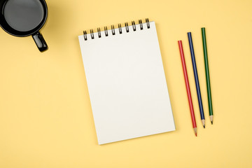 Flay lay picture with blank notepad page