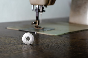 spool of thread on sewing machine