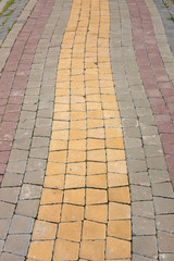 Fototapeta premium Colorful Stone pathway in the park