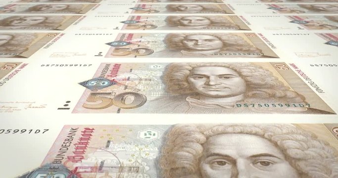 Banknotes of fifty german marks of the West Germany rolling, cash money