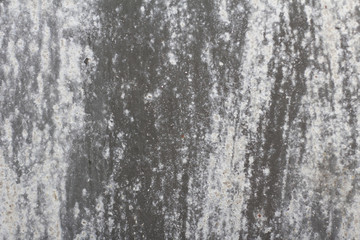 old wall. texture metal door. it was painted in dark gray. light wear.