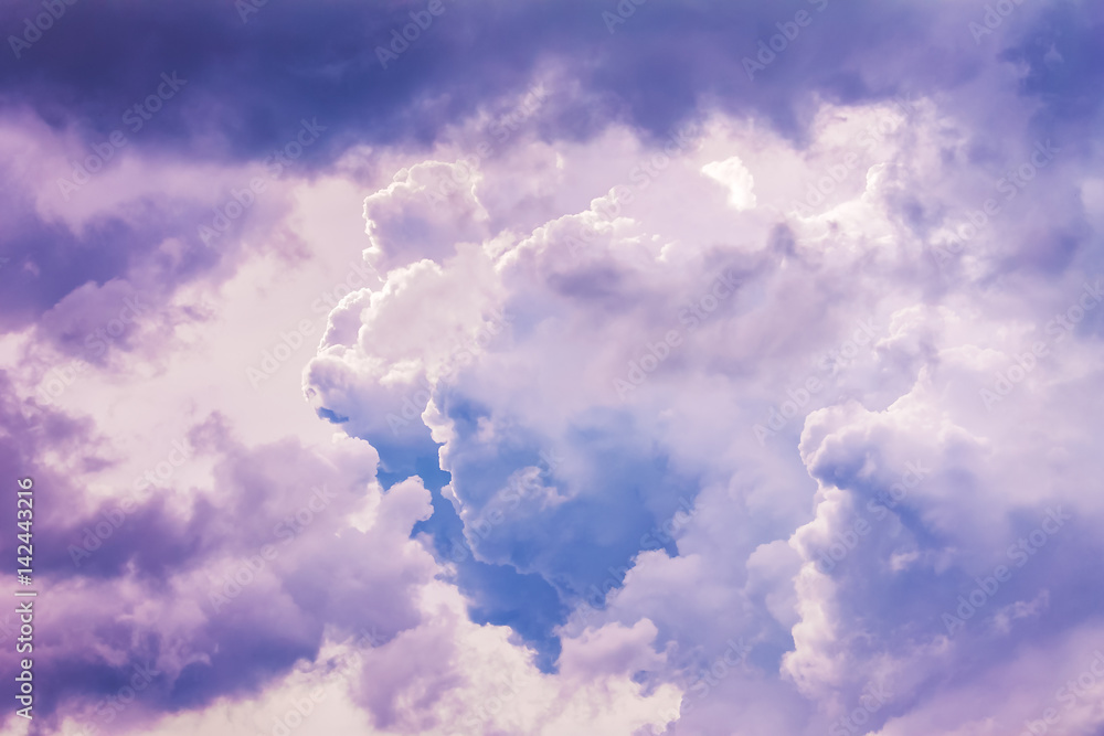 Wall mural Evening morning sky with fluffy clouds of soft pastel tones. Nature background, wallpaper.