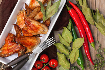 Chicken wings and spices. Selective focus. Top view. Copy space