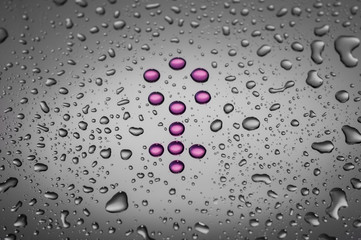 Gender symbol girl made out of water drops