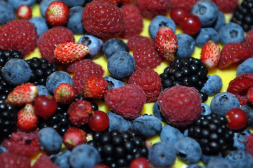 High angle view of berries on fruitcake. Red Fruit