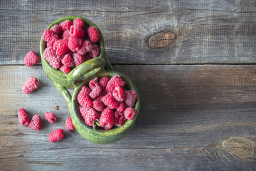 Fresh raspberries on wooden table