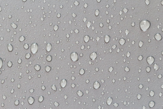 waterdrop on gray steel texture