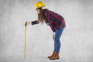 Construction worker leaning, copy space next to the meter