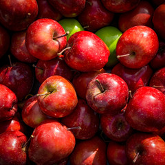Red apples background. apples in a market stall