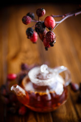 Dried red rose hips and tea