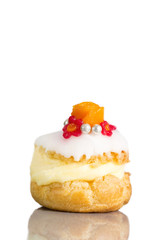 Cream puff cakes or profiterole filled with whipped cream