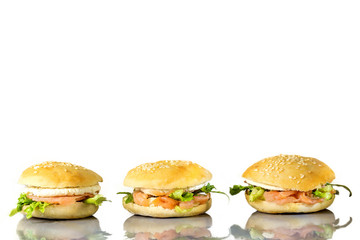 Grilled burger with smoked salmon, on white