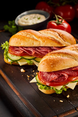 Close up on salami sandwiches