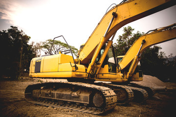 Excavators machine in construction site on sky backgrou
