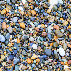 Sea stones background. stones on beach. stone texture.