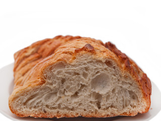 sliced loaf of white french country bread