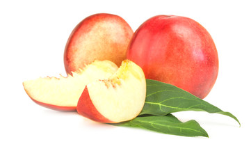 Ripe peaches on a white background. Clipping path