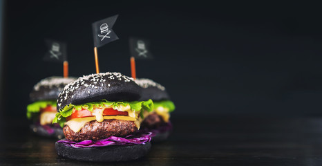 Steep black hamburgers for real black brothers. The concept of pirates
