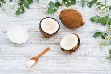 Still life with coconut and coconut flakes, healthy food concept