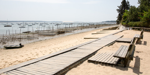  wooden path for walking tourist on the beach in summer
