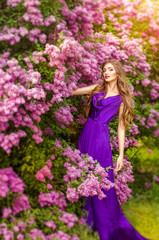 beautiful girl in a vintage style in a fabulous purple park