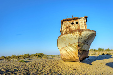Fototapeta na wymiar Rusted vessel in the ship cemetery, Uzbekistan