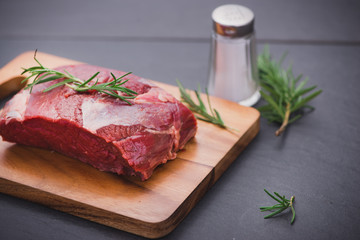 Raw beef meat on a cutting board