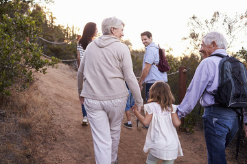 Multi Generation Family On Hike Through Countryside