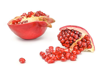 Slice of ripe juicy pomegranate isolated on white
