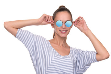 smiling young woman wearing modern sunglasses