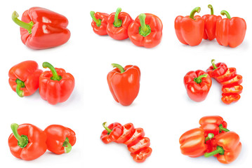 Collection of red bell peppers over a white background