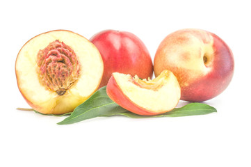 Beautiful ripe peaches isolated on a white background cutout