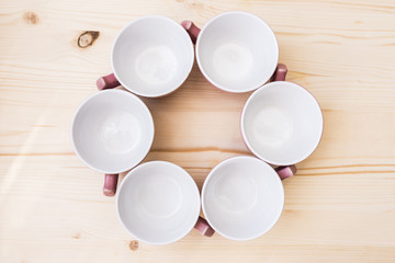 6 empty tea cup on table