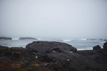 Volcano Stones at Stormy Sea