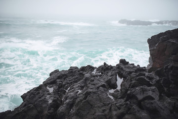 Fototapeta na wymiar Wet Rock at Sea