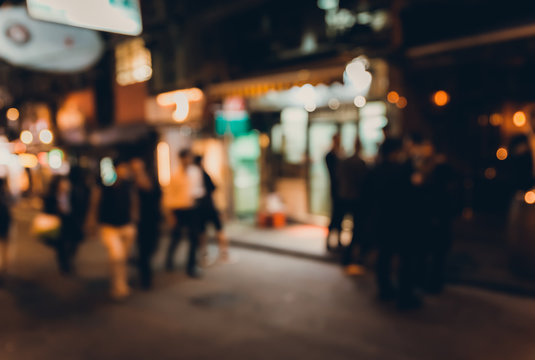 Abstract bokeh background of people at lan kwai fong on friday night 
