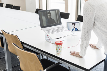 Businesswoman having a video conference in office