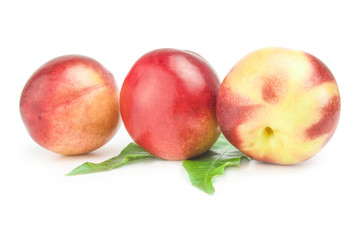 Fresh peaches fruits isolated on a white background cutout
