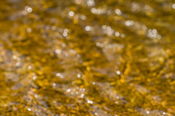 Bokeh from reflection of light on the water