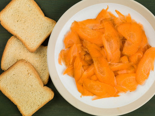 Plate of Sliced or Grated Carrots with French Toast