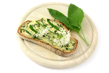 wild garlic butter on slice of bread. breakfast