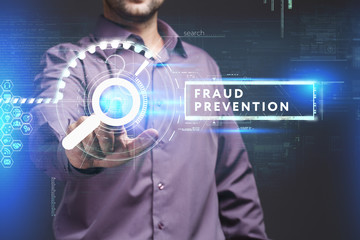 Business, Technology, Internet and network concept. Young businessman working on a virtual screen of the future and sees the inscription: Fraud prevention