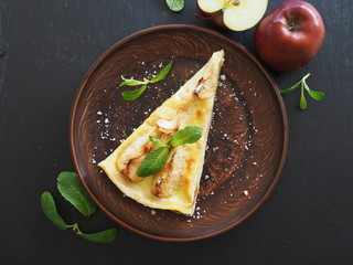 Apple pie with mint leaves