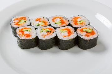 sake avocado maki sushi on a white plate