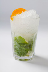 Cocktail mojito in front of white background